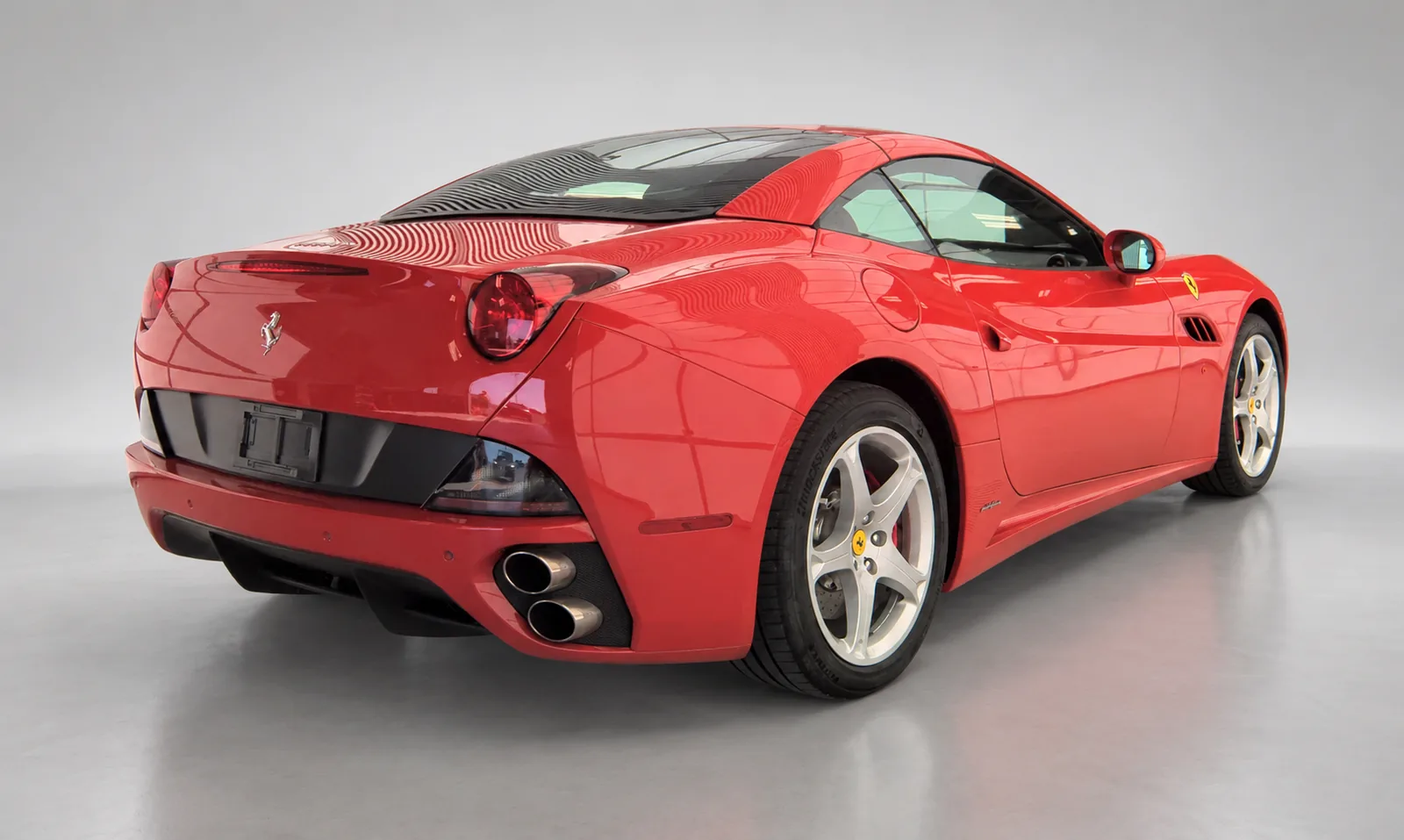 2010 Ferrari California, red, rear three-quarter