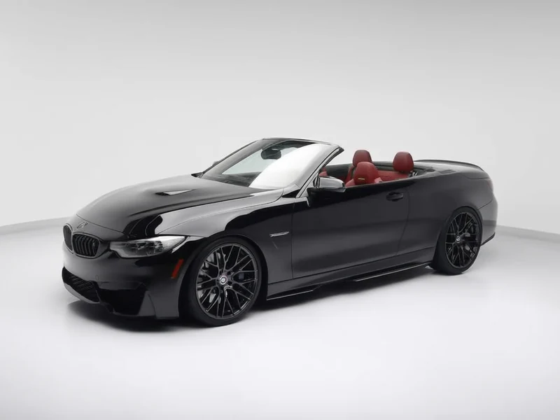 2016 BMW M4 Convertible, black, top down